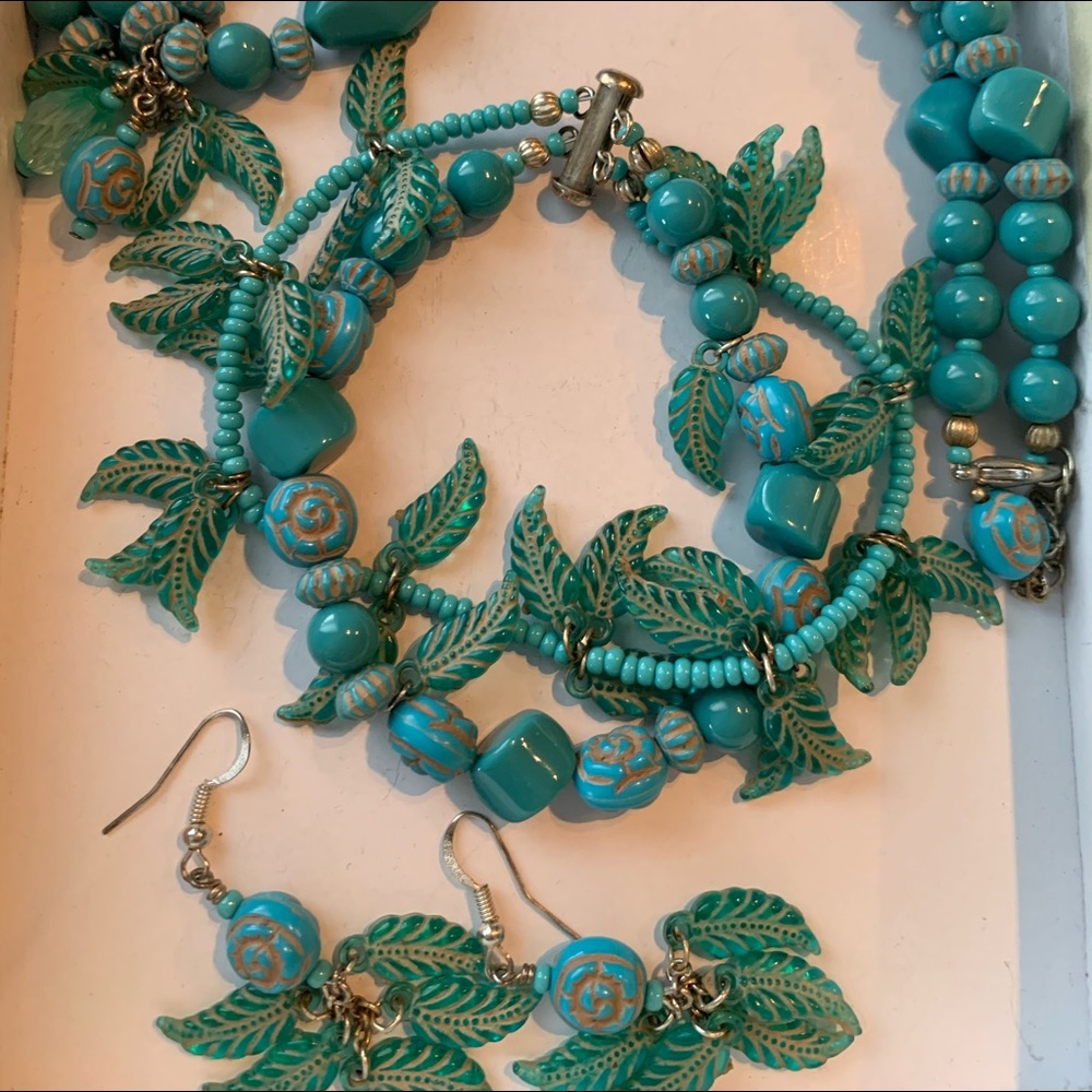 Necklace, bracelet, earrings.